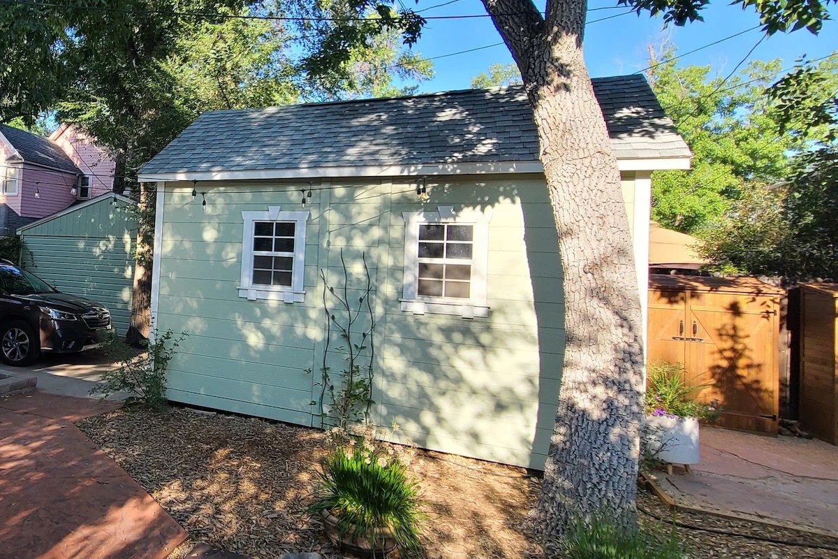 Exterior side view of backyard shed